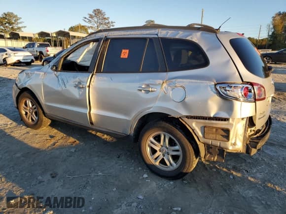 ✅ 2012 Hyundai Santa Fe GLS • VIN: 5XYZG3ABXCG093807 • Lot: 81119164. Listed on Copart with 103,403 mi. Free auction sales archive from the USA and detailed vehicle history report at DreamBid. Image 2.