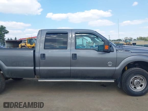 ✅ 2014 Ford F-350 Platinum • VIN: 1FT7W3BTXEEB29055 • Lot: 43237706. Listed on IAAI with 235,411 mi. Free auction sales archive from the USA and detailed vehicle history report at DreamBid. Image 13.