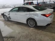 ✅ 2021 Toyota Avalon • VIN: 4T1MB1BB9MU001531 • Lot: 62592145. Wystawiony na Copart z przebiegiem 90 936 mil. Bezpłatny archiwum sprzedaży aukcyjnych z USA i szczegółowy raport historii pojazdu na DreamBid. Zdjęcie 2.
