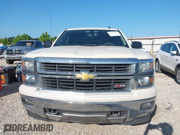✅ 2014 Chevrolet Silverado 1500 LT • VIN: 3GCUKREC1EG244911 • Лот: 42762159. Опубликован ранее на IAAI с пробегом 127 545 миль. Бесплатный доступ к архиву аукционных продаж из США и подробный отчёт об истории автомобиля на DreamBid. Изображение 12.