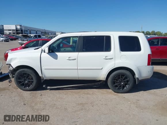 ✅ 2014 Honda Pilot EX-L • VIN: 5FNYF4H50EB037373 • Lot: 43495075. Listed on IAAI with 208,220 mi. Free auction sales archive from the USA and detailed vehicle history report at DreamBid. Image 14.