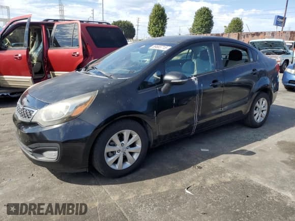 ✅ 2014 Kia Rio EX • VIN: KNADN4A3XE6378735 • Lot: 89665715. Listed on Copart with 96,582 mi. Free auction sales archive from the USA and detailed vehicle history report at DreamBid. Image 1.