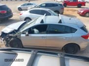 ✅ 2017 Subaru Impreza • VIN: 4S3GTAA63H1734443 • Lot: 42392197. Listed on IAAI with 141,479 mi. Free auction sales archive from the USA and detailed vehicle history report at DreamBid. Image 14.