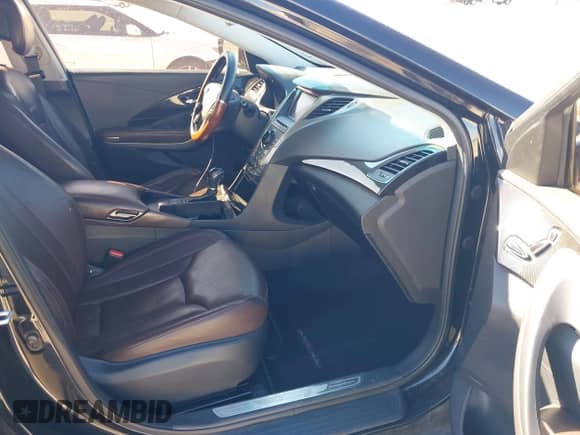 2013 Hyundai Azera с VIN KMHFG4JG3DA257044, выставлен на аукционе IAAI как лот 38729391 с пробегом 121 101 миль миль и . История ставок и продаж доступна на DreamBid. Изображение 5.