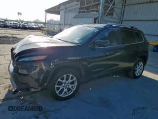✅ 2016 Jeep Cherokee Latitude • VIN: 1C4PJLCB9GW355833 • Лот: 82242225. Опубликован ранее на Copart с пробегом 167 019 миль. Бесплатный доступ к архиву аукционных продаж из США и подробный отчёт об истории автомобиля на DreamBid. Изображение 1.