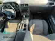 2013 Dodge Challenger SXT z VIN 2C3CDYAG1DH607722, wystawiony jako Copart lot #75570584 z przebiegiem 130 922 mil mil oraz Czysty tytuł • Clean title. Historia ofert i sprzedaży dostępna na DreamBid. Obrazek 9.