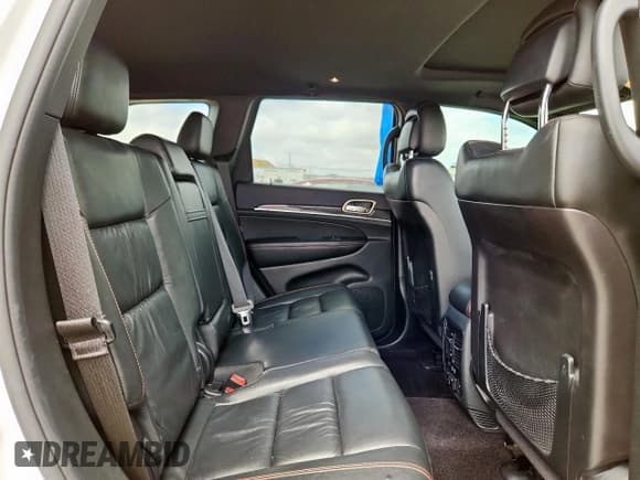 ✅ 2016 Jeep Grand Cherokee Limited 75th Anniversary • VIN: 1C4RJEBG5GC451560 • Lot: 62465485. Listed on Copart with 104,073 mi. Free auction sales archive from the USA and detailed vehicle history report at DreamBid. Image 11.