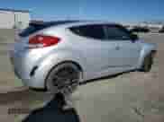 2016 Hyundai Veloster z VIN KMHTC6ADXGU280243, wystawiony jako Copart lot #80582145 z przebiegiem Nie podano mil oraz Szkoda całkowita • Salvage title. Historia ofert i sprzedaży dostępna na DreamBid. Obrazek 3.