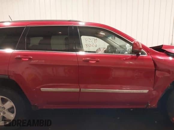 ✅ 2011 Jeep Grand Cherokee Laredo • VIN: 1J4RR4GG4BC550949 • Lot: 43546308. Listed on IAAI with 204,503 mi. Free auction sales archive from the USA and detailed vehicle history report at DreamBid. Image 14.