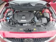 ✅ 2022 Mazda CX-5 Signature • VIN: JM3KFBXYXN0607777 • Lot: 41563918. Listed on IAAI with 8,893 mi. Free auction sales archive from the USA and detailed vehicle history report at DreamBid. Image 10.