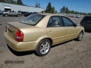 ✅ 2003 Mazda Protege DX • VIN: JM1BJ225631193019 • Lot: 81088365. Listed on Copart with 128,031 mi. Free auction sales archive from the USA and detailed vehicle history report at DreamBid. Image 3.