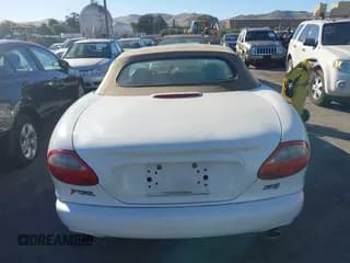 ✅ 1997 Jaguar XK • VIN: SAJGX2745VC014787 • Lot: 43618083. Wystawiony na IAAI z przebiegiem 84 279 mil. Bezpłatny archiwum sprzedaży aukcyjnych z USA i szczegółowy raport historii pojazdu na DreamBid. Zdjęcie 6.