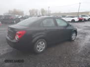 ✅ 2016 Chevrolet Sonic LS • VIN: 1G1JA5SG4G4172813 • Lot: 43608147. Listed on IAAI with 74,048 mi. Free auction sales archive from the USA and detailed vehicle history report at DreamBid. Image 4.