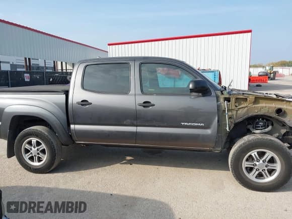 ✅ 2012 Toyota Tacoma PreRunner • VIN: 5TFJU4GN7CX019769 • Lot: 43735015. Listed on IAAI with 116,237 mi. Free auction sales archive from the USA and detailed vehicle history report at DreamBid. Image 13.