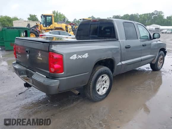 2007 Dodge Dakota SLT with VIN 1D7HW48K17S129383, listed as a IAAI auction lot 42253930 with 164,430 mi miles and . Bid and sale history available at DreamBid. Image 4.