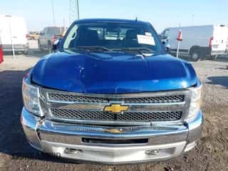 2013 Chevrolet Silverado 1500 LT z VIN 3GCPCSE06DG156927, wystawiony jako IAAI lot #43409330 z przebiegiem 123 950 mil mil oraz . Historia ofert i sprzedaży dostępna na DreamBid. Obrazek 6.