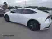 2024 Toyota Prius LE with VIN JTDACAAU6R3035544, listed as a IAAI auction lot 43413536 with 19,097 mi miles and . Bid and sale history available at DreamBid. Image 3.