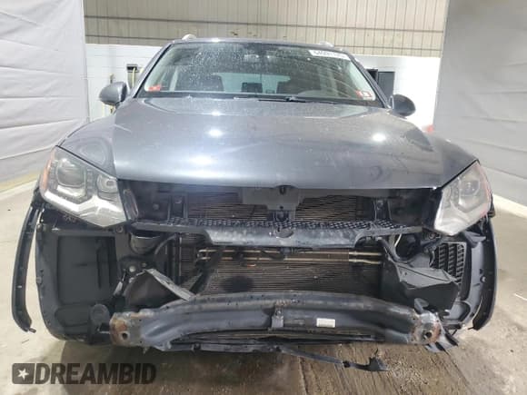 ✅ 2012 Volkswagen Touareg Lux • VIN: WVGEF9BP4CD006475 • Lot: 64091175. Listed on Copart with 179,996 mi. Free auction sales archive from the USA and detailed vehicle history report at DreamBid. Image 5.