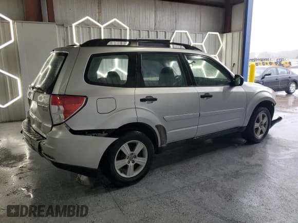 ✅ 2010 Subaru Forester X • VIN: JF2SH6BC1AH781854 • Lot: 90033625. Listed on Copart with 93,817 mi. Free auction sales archive from the USA and detailed vehicle history report at DreamBid. Image 3.