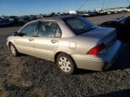 ✅ 2003 Mitsubishi Lancer ES • VIN: JA3AJ26E13U097057 • Lot: 41641965. Listed on Copart with 123,786 mi. Free auction sales archive from the USA and detailed vehicle history report at DreamBid. Image 2.