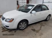 ✅ 2009 Kia Spectra EX • VIN: KNAFE221795662135 • Lot: 43847748. Listed on IAAI with 99,869 mi. Free auction sales archive from the USA and detailed vehicle history report at DreamBid. Image 2.