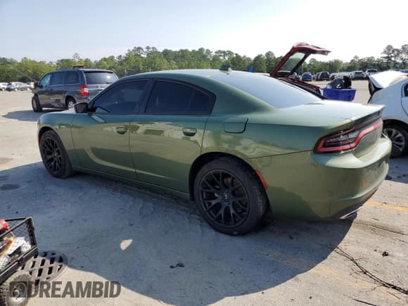 ✅ 2023 Dodge Charger SXT • VIN: 2C3CDXBG3PH674500 • Lot: 69868595. Listed on Copart with 24,205 mi. Free auction sales archive from the USA and detailed vehicle history report at DreamBid. Image 2.