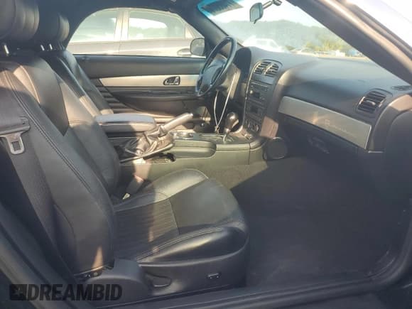 ✅ 2005 Ford Thunderbird Deluxe • VIN: 1FAHP60A45Y103477 • Lot: 71405074. Wystawiony na Copart z przebiegiem 84 866 mil. Bezpłatny archiwum sprzedaży aukcyjnych z USA i szczegółowy raport historii pojazdu na DreamBid. Zdjęcie 10.