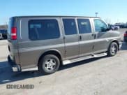 ✅ 2004 Chevrolet Express Passenger • VIN: 1GBFG15T341149179 • Lot: 41964604. Listed on IAAI with 179,725 mi. Free auction sales archive from the USA and detailed vehicle history report at DreamBid. Image 4.