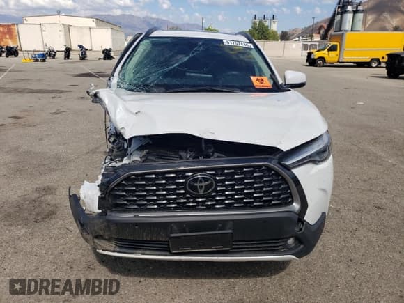 ✅ 2023 Toyota Corolla Cross XLE • VIN: 7MUDAABG1PV059148 • Лот: 81757435. Опубликован ранее на Copart с пробегом Не указан. Бесплатный доступ к архиву аукционных продаж из США и подробный отчёт об истории автомобиля на DreamBid. Изображение 5.