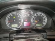 ✅ 2003 Volkswagen Passat GLX • VIN: WVWYH63B13E151741 • Lot: 46726265. Wystawiony na Copart z przebiegiem 156 923 mil. Bezpłatny archiwum sprzedaży aukcyjnych z USA i szczegółowy raport historii pojazdu na DreamBid. Zdjęcie 9.