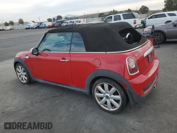 ✅ 2009 MINI Convertible S • VIN: WMWMS33569TG89140 • Lot: 92157175. Wystawiony na Copart z przebiegiem 125 093 mil. Bezpłatny archiwum sprzedaży aukcyjnych z USA i szczegółowy raport historii pojazdu na DreamBid. Zdjęcie 2.