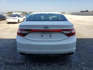 2015 Hyundai Azera z VIN KMHFG4JG7FA479119, wystawiony jako Copart lot #77689064 z przebiegiem 230 075 mil mil oraz Szkoda całkowita • Salvage title. Historia ofert i sprzedaży dostępna na DreamBid. Obrazek 6.