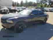 2013 Dodge Charger SXT z VIN 2C3CDXHG5DH537495, wystawiony jako Copart lot #89931325 z przebiegiem 144 857 mil mil oraz Szkoda całkowita • Salvage title. Historia ofert i sprzedaży dostępna na DreamBid. Obrazek 1.