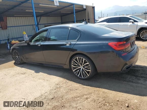 ✅ 2019 BMW 7 Series 740i • VIN: WBA7E2C57KB217133 • Lot: 70962405. Listed on Copart with 99,965 mi. Free auction sales archive from the USA and detailed vehicle history report at DreamBid. Image 2.