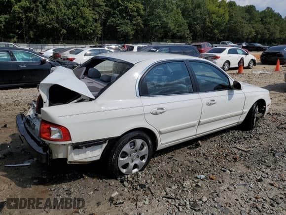 ✅ 2004 Kia Optima LX • VIN: KNAGD126245258259 • Лот: 80200765. Опубликован ранее на Copart с пробегом 69 816 миль. Бесплатный доступ к архиву аукционных продаж из США и подробный отчёт об истории автомобиля на DreamBid. Изображение 3.