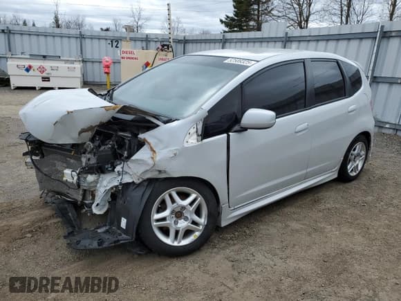 ✅ 2009 Honda Fit • VIN: JHMGE87579S803694 • Лот: 52589325. Опубликован ранее на Copart с пробегом 238 084 миль. Бесплатный доступ к архиву аукционных продаж из США и подробный отчёт об истории автомобиля на DreamBid. Изображение 1.