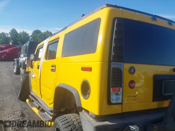 ✅ 2004 Hummer H2 • VIN: 5GRGN23UX4H118685 • Lot: 41790000. Listed on IAAI with Not provided. Free auction sales archive from the USA and detailed vehicle history report at DreamBid. Image 14.
