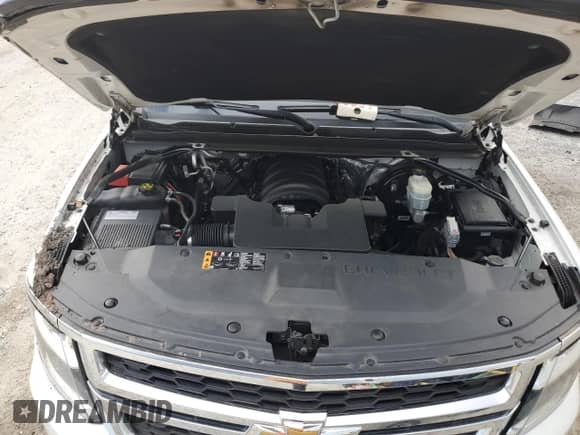 2017 Chevrolet Suburban LT z VIN 1GNSCHKC2HR299687, wystawiony jako Copart lot #64944284 z przebiegiem Nie podano mil oraz Szkoda całkowita • Salvage title. Historia ofert i sprzedaży dostępna na DreamBid. Obrazek 13.