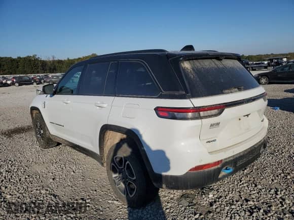 2022 Jeep Grand Cherokee Trailhawk with VIN 1C4RJYC63N8747507, listed as a Copart auction lot 76771914 with 18,057 mi miles and Salvage title. Bid and sale history available at DreamBid. Image 2.