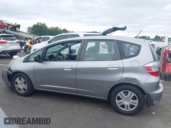 ✅ 2009 Honda Fit • VIN: JHMGE88289S055025 • Lot: 43424630. Wystawiony na IAAI z przebiegiem 319 864 mil. Bezpłatny archiwum sprzedaży aukcyjnych z USA i szczegółowy raport historii pojazdu na DreamBid. Zdjęcie 14.