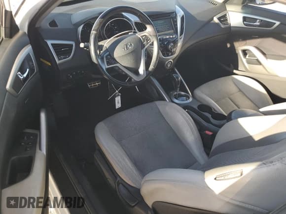 ✅ 2014 Hyundai Veloster • VIN: KMHTC6AD4EU209424 • Lot: 87465194. Wystawiony na Copart z przebiegiem 112 208 mil. Bezpłatny archiwum sprzedaży aukcyjnych z USA i szczegółowy raport historii pojazdu na DreamBid. Zdjęcie 8.