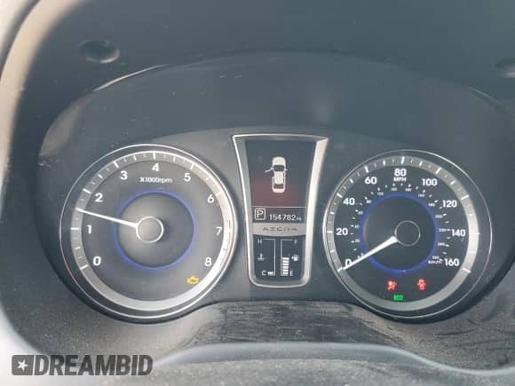 2012 Hyundai Azera с VIN KMHFH4JG8CA186371, выставлен на аукционе Copart как лот 48458795 с пробегом 154 782 миль миль и Списание • Salvage title. История ставок и продаж доступна на DreamBid. Изображение 9.