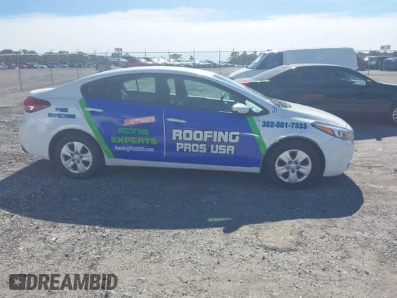 ✅ 2018 Kia Forte LX • VIN: 3KPFL4A7XJE181718 • Lot: 43649520. Listed on IAAI with 149,169 mi. Free auction sales archive from the USA and detailed vehicle history report at DreamBid. Image 13.