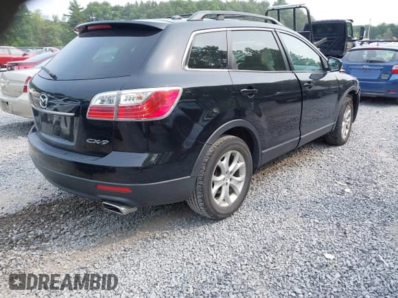 ✅ 2011 Mazda CX-9 Touring • VIN: JM3TB2CV8B0323846 • Lot: 42917718. Listed on IAAI with 155,206 mi. Free auction sales archive from the USA and detailed vehicle history report at DreamBid. Image 4.
