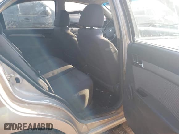 ✅ 2009 Chevrolet Aveo 1LT • VIN: KL1TD56E49B372791 • Lot: 41890124. Wystawiony na IAAI z przebiegiem 118 648 mil. Bezpłatny archiwum sprzedaży aukcyjnych z USA i szczegółowy raport historii pojazdu na DreamBid. Zdjęcie 8.