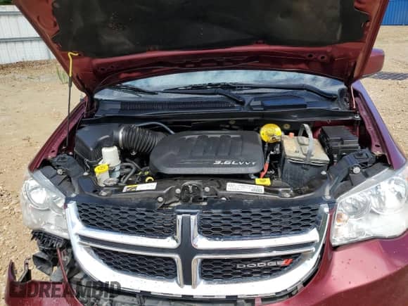 2018 Dodge Grand Caravan SXT z VIN 2C4RDGCG1JR209008, wystawiony jako Copart lot #65998505 z przebiegiem 152 674 mil mil oraz Szkoda całkowita • Salvage title. Historia ofert i sprzedaży dostępna na DreamBid. Obrazek 12.