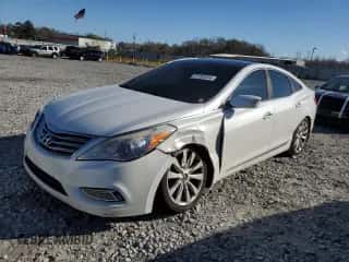 2013 Hyundai Azera с VIN KMHFH4JG7DA321468, выставлен на аукционе Copart как лот 87069554 с пробегом 147 382 миль миль и Списание • Salvage title. История ставок и продаж доступна на DreamBid. Изображение 1.