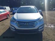 ✅ 2014 Hyundai Santa Fe • VIN: 5XYZUDLB4EG205418 • Lot: 43058157. Listed on IAAI with 137,818 mi. Free auction sales archive from the USA and detailed vehicle history report at DreamBid. Image 12.