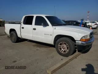 ✅ 2001 Dodge Dakota Sport • VIN: 1B7GL2AN61S106759 • Lot: 87423404. Wystawiony na Copart z przebiegiem 300 360 mil. Bezpłatny archiwum sprzedaży aukcyjnych z USA i szczegółowy raport historii pojazdu na DreamBid. Zdjęcie 4.