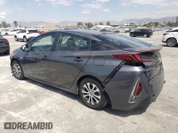 2021 Toyota Prius LE z VIN JTDKAMFP7M3176372, wystawiony jako Copart lot #68893794 z przebiegiem 59 421 mil mil oraz Szkoda całkowita • Salvage title. Historia ofert i sprzedaży dostępna na DreamBid. Obrazek 2.